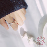 Simple Adjustable X Cross Ring